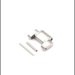 Close-up of a vintage camera on a wooden table.